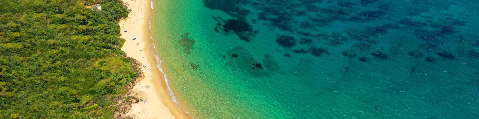 Aerial drone ultra wide panoramic photo of tropical exotic emerald sea wit turquoise crystal clear waters in asian destination island