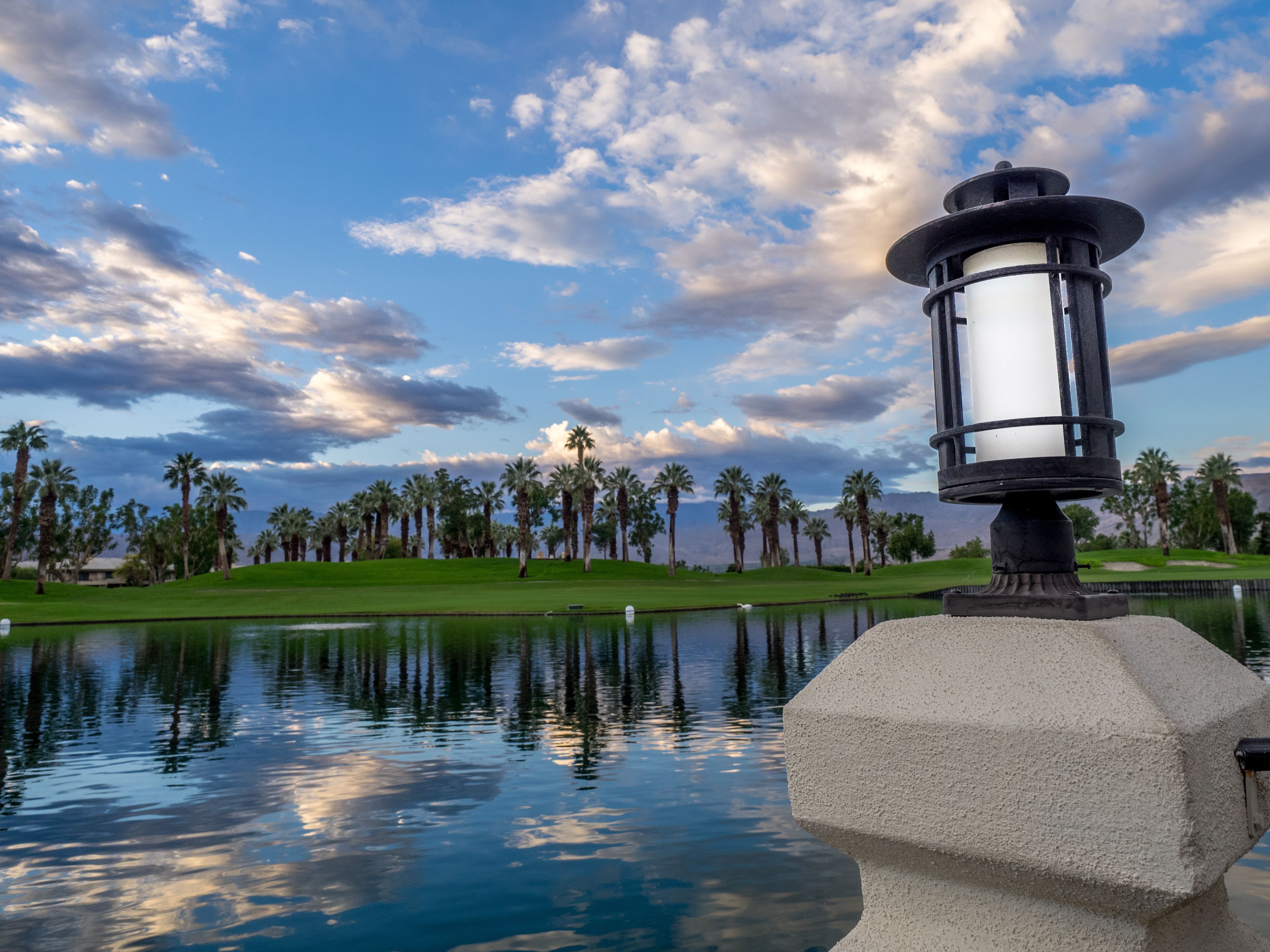 Golf course and water feature in Palm Desert California at sunrise. 