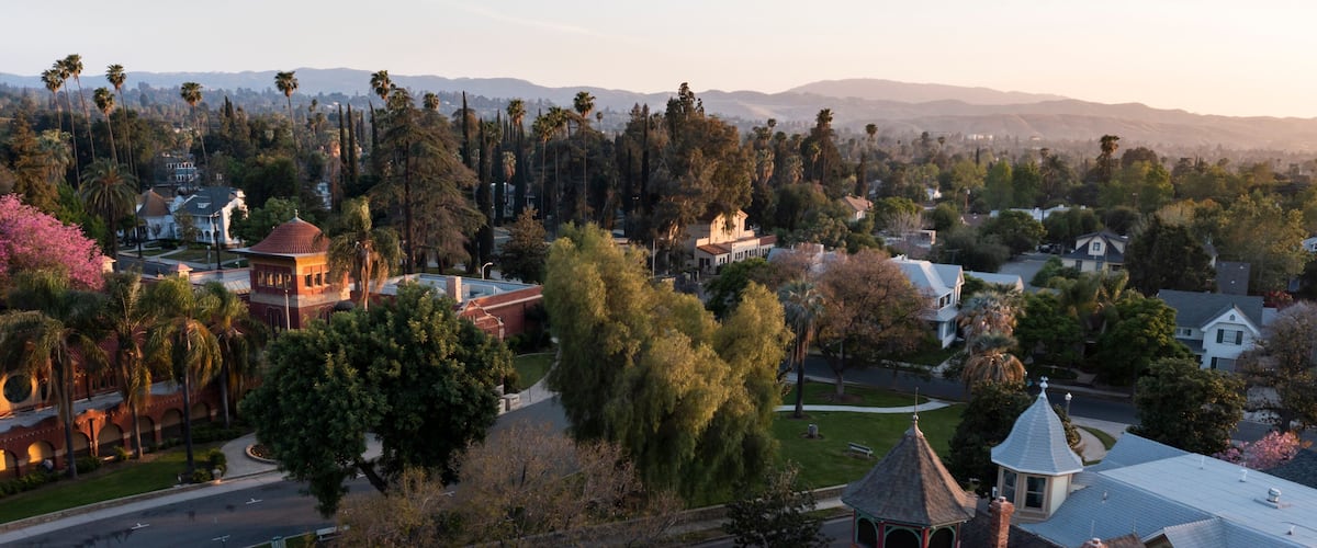 Sunset aerial view of historic downtown Redlands, California, USA.