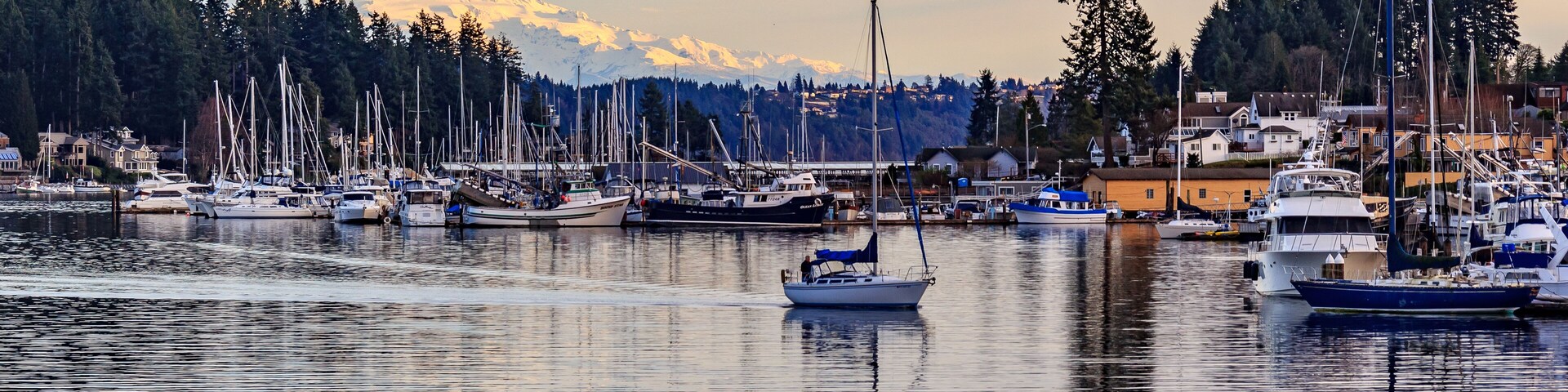 Sailboat headed back to dock in Gig Harbor; Shutterstock ID 595218038