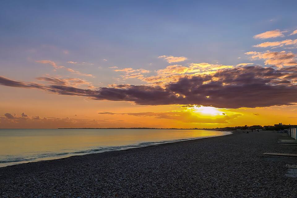 Sunset over Aldwick Beach in Bognor Regis, West Sussex