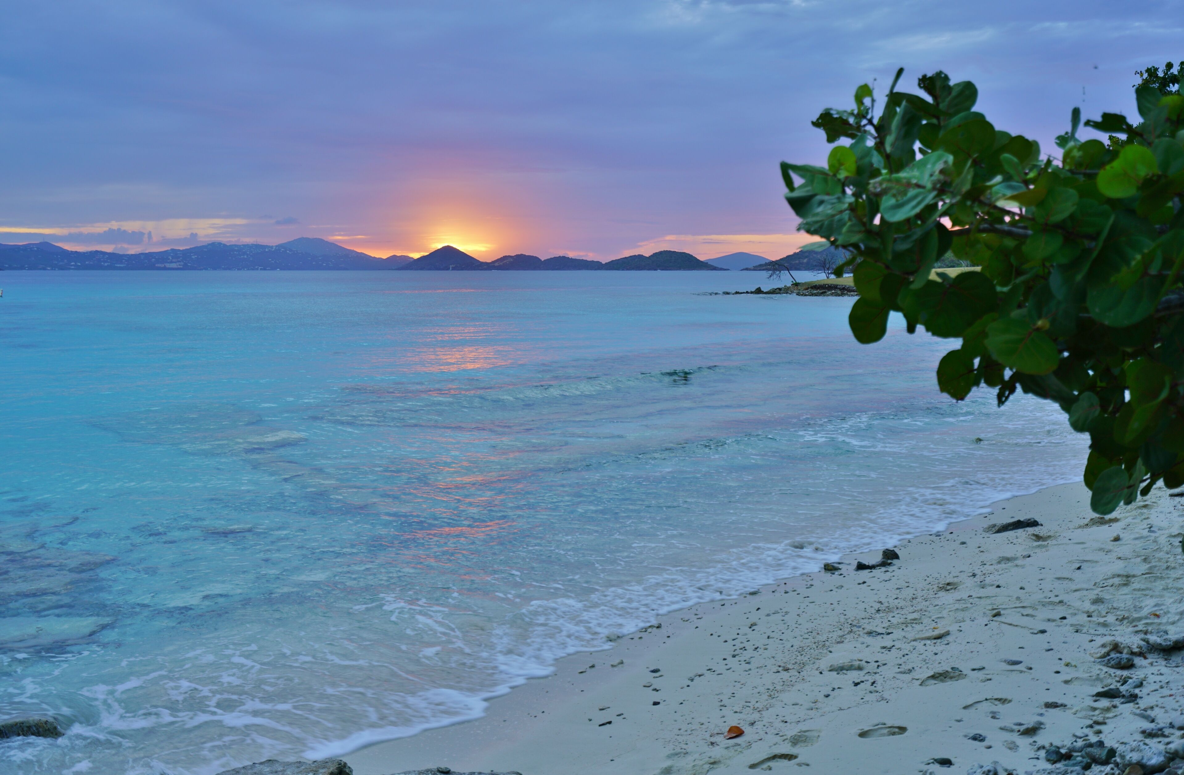 Sunset over a tropical beach and the Caribbean Sea in St John, U.S. Virgin Islands