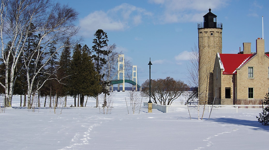 Mackinaw Point Lighthouse with the Mackinaw Bridge in the background. #OnTheRoad