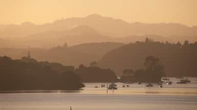 Paihia showing a bay or harbour, tranquil scenes and a sunset