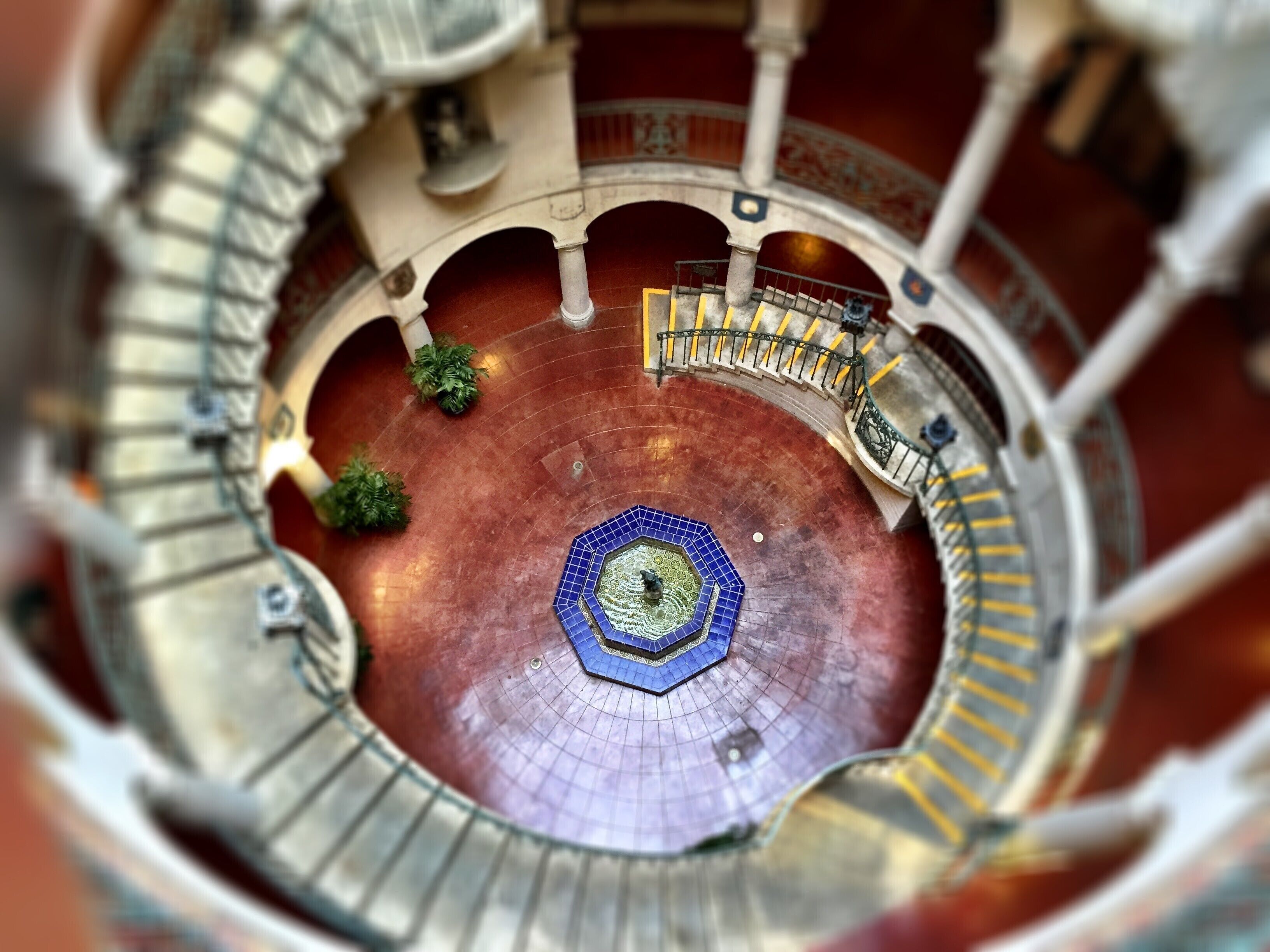 One of my favorite places at the Mission Inn is a bit hard to find. It's near the back of the property where there's a several story open atrium with a gorgeous spiral staircase that seems to float in mid-air. It's absolutely stunning to see in person.

#details