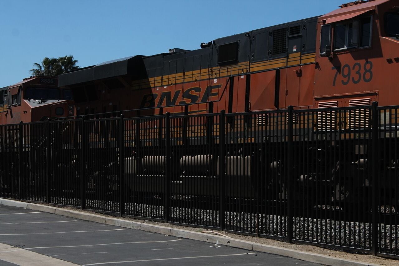 Passing train in downtown Riverside just passing over Arlington Ave.