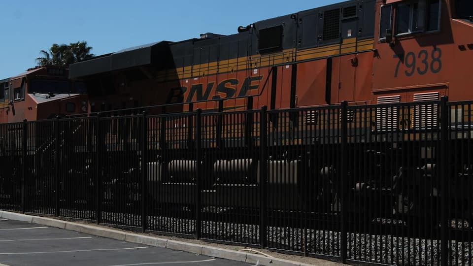 Passing train in downtown Riverside just passing over Arlington Ave.