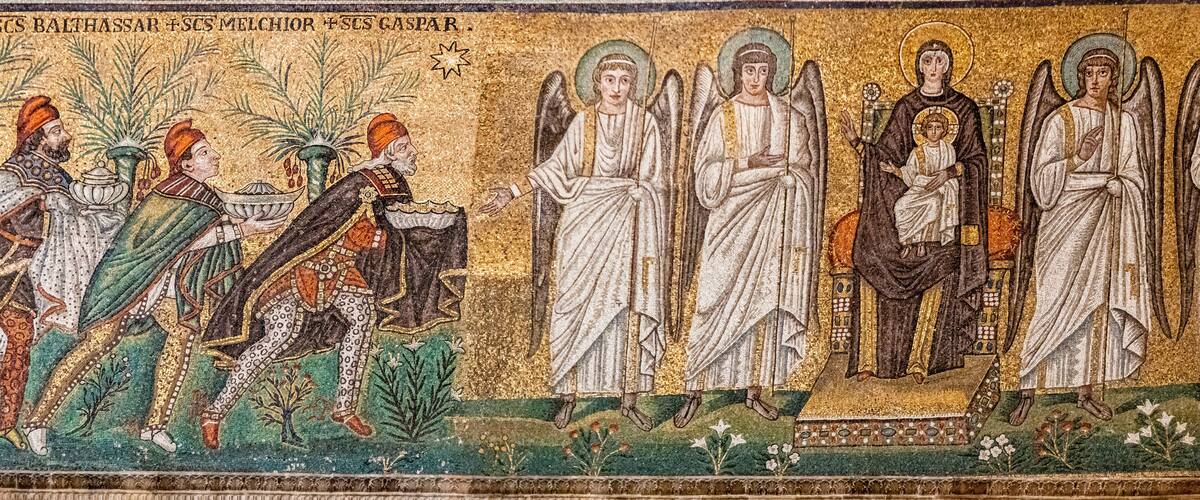 A mosaic with figures in robes, some holding objects, and others with halos, set against a gold background with green foliage.