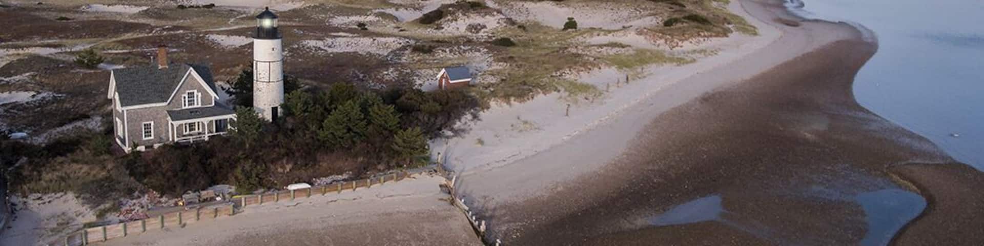 Sandy Neck Lighthouse on Cape Cod in West Barnstable MA. On a remote stretch of beach.