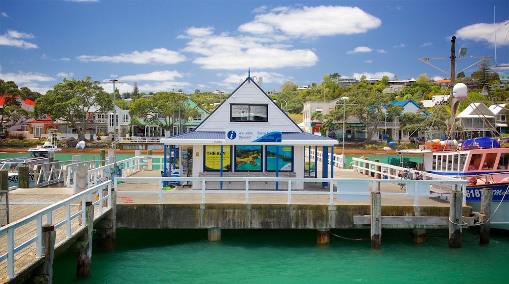 Russell featuring a bay or harbor and a coastal town