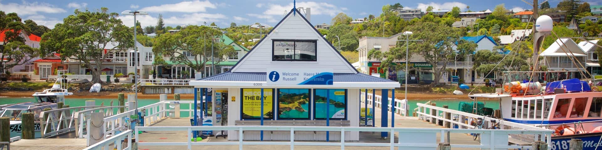 Russell featuring a bay or harbor and a coastal town