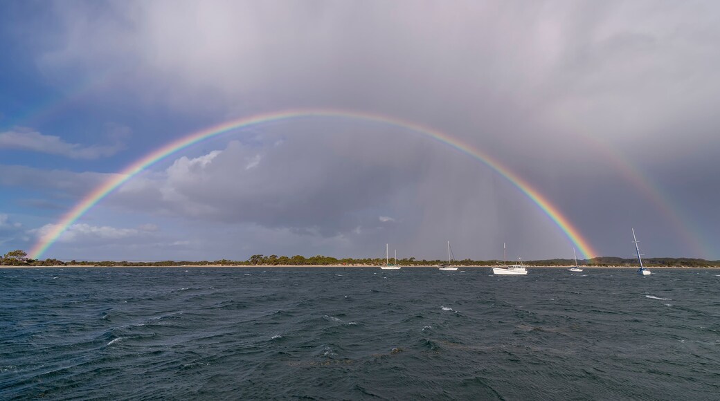 Superb complete rainbow on the coast of Kangaroo Island, Southern Australia
