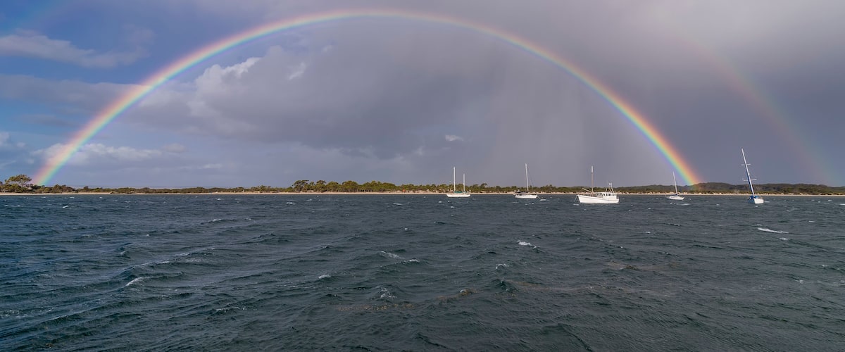 Superb complete rainbow on the coast of Kangaroo Island, Southern Australia
