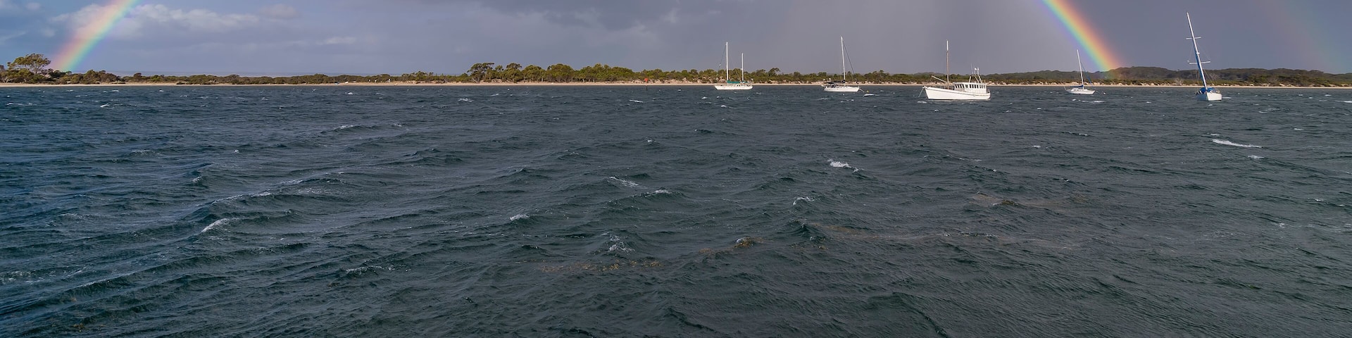 Superb complete rainbow on the coast of Kangaroo Island, Southern Australia