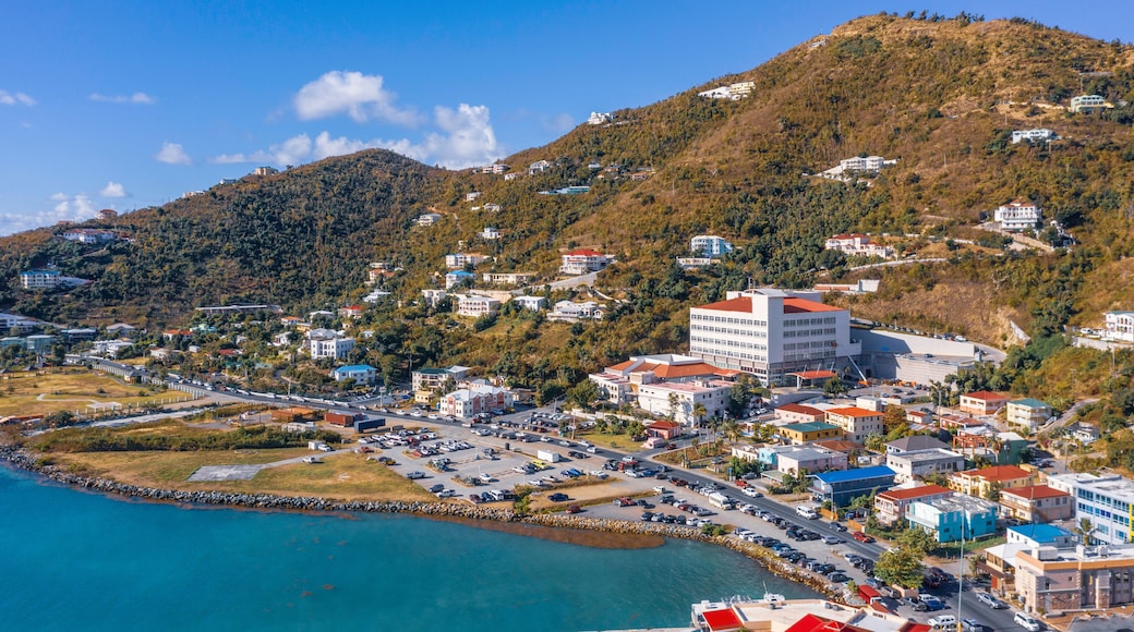 Scenic aerial view of capital of British Virgin Islands Tortola. Beautiful sunny summer landscape of little tropical islands in Caribbean sea. Look of port of small town on green hills.