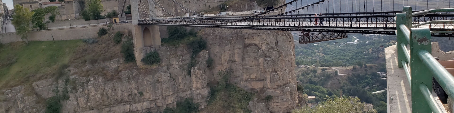 Sidi M'Cid Bridge is a 164 m long suspension bridge across the Rhummel River in Constantine, Algeria. It was opened to traffic in April 1912 and until 1929 was the highest bridge in the world at 175 m. The bridge was designed by French engineer Ferdinand Arnodin and links the Casbah to Sidi M'Cid hill.
#history