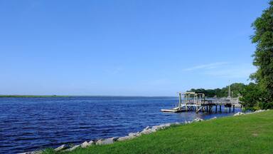 Boat dock with water view and blue sky; Shutterstock ID 469581212; Purchase Order: -