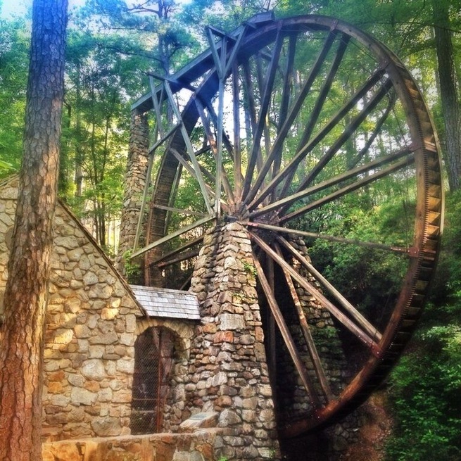 On your future tour of Georgia you may want to stop by Berry College. Just a hour and a half away from Atlanta it's an easy way to experience the foothills of the smokies.
This is the Berry college mill. Constructed in 1930, the wooden overshot waterwheel, considered one of the largest in the world at 42 feet in diameter, was constructed by student workers. The Old Mill is operated on special occasions, such as Mountain Day. When available, the Oak Hill Gift Shop sells cornmeal ground at the Old Mill.