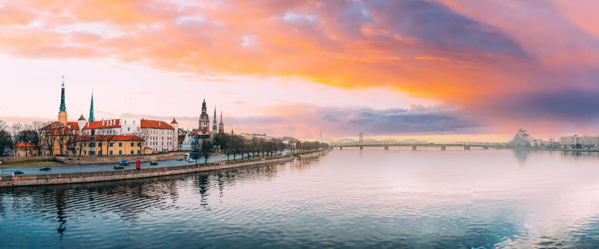Riga, Latvia, Europe. Cityscape In Winter Morning. Skyline With Castle, Dome Cathedral And St. Peter's Church. Popular Place With Famous Landmarks. UNESCO World Heritage Site