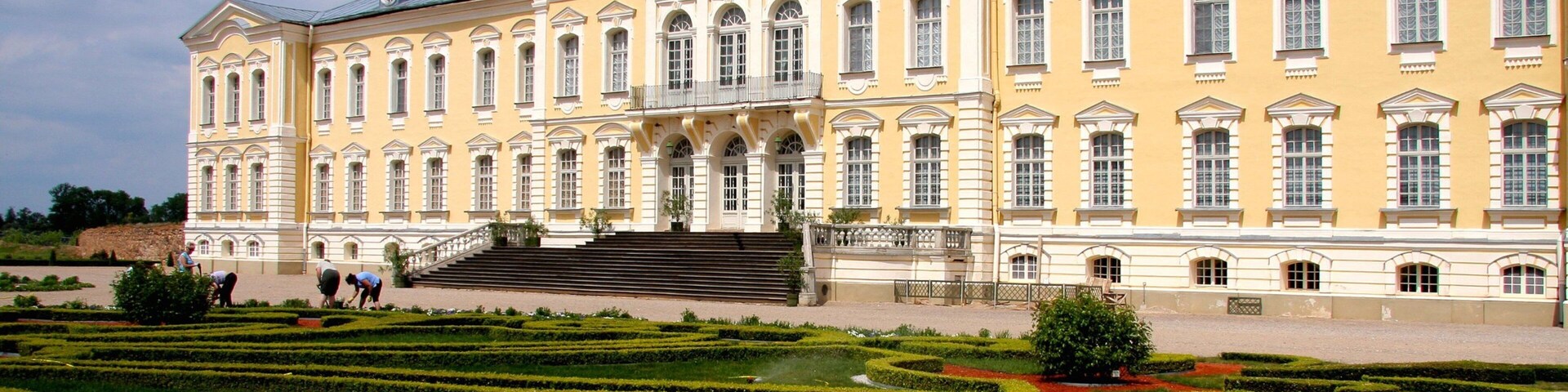 Latvia featuring a garden and heritage architecture