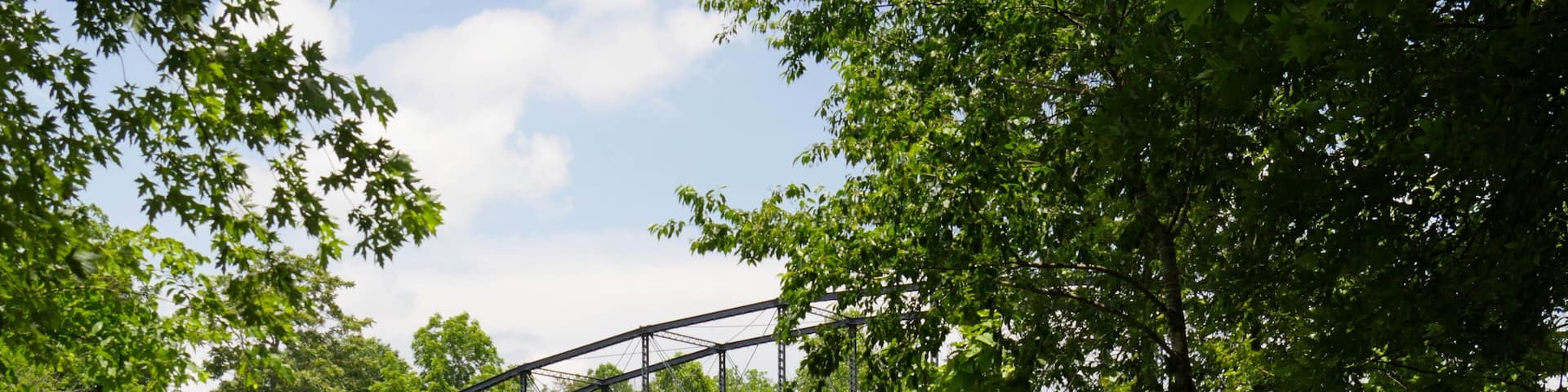 Side view of the War Eagle Mill bridge, a landmark in Rogers, and one of the most photographed in northwest Arkansas.