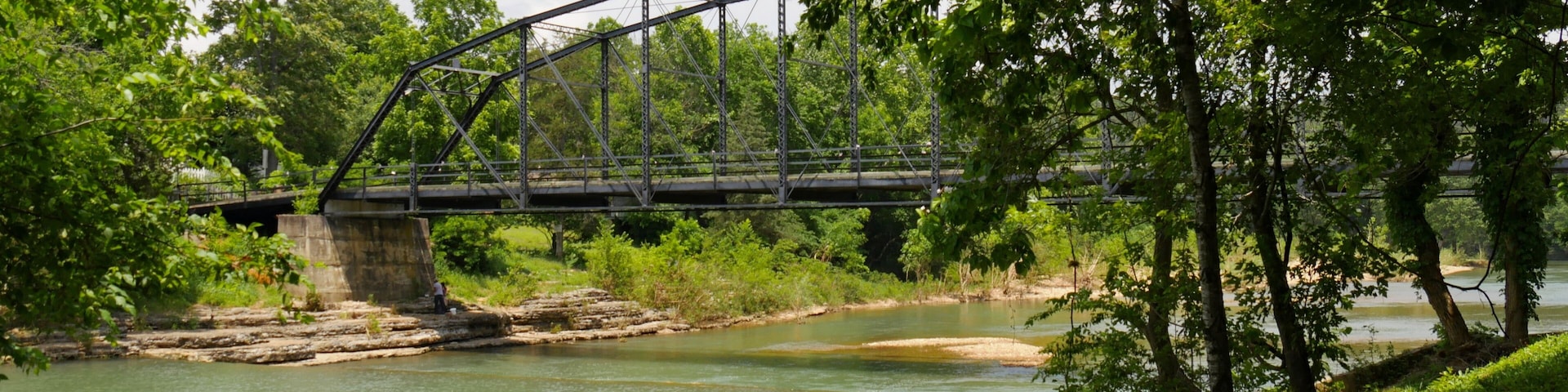 Side view of the War Eagle Mill bridge, a landmark in Rogers, and one of the most photographed in northwest Arkansas.