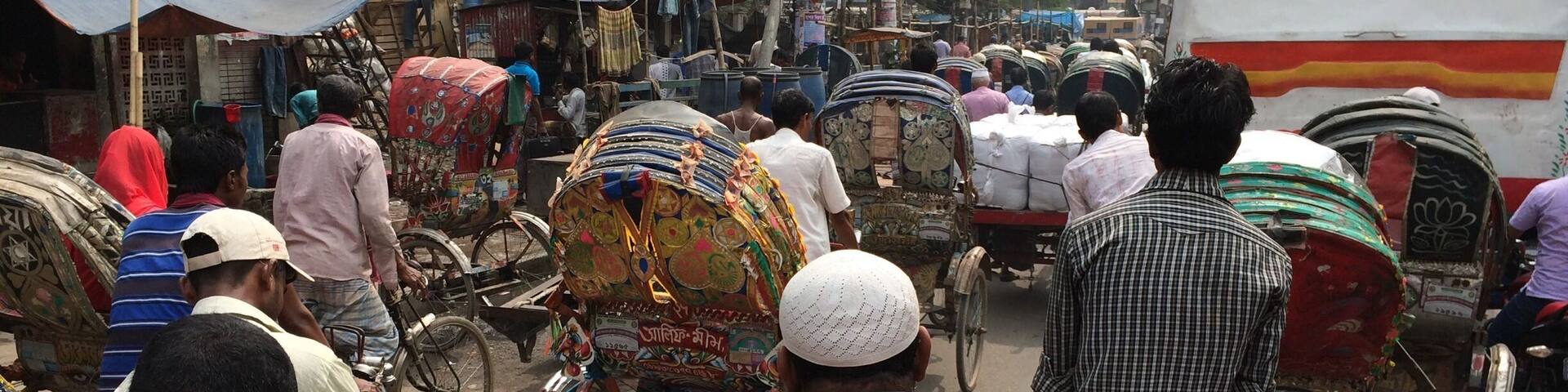 The daily craziness around old Dhaka with about 400,000 rickshaws competing for very little space.