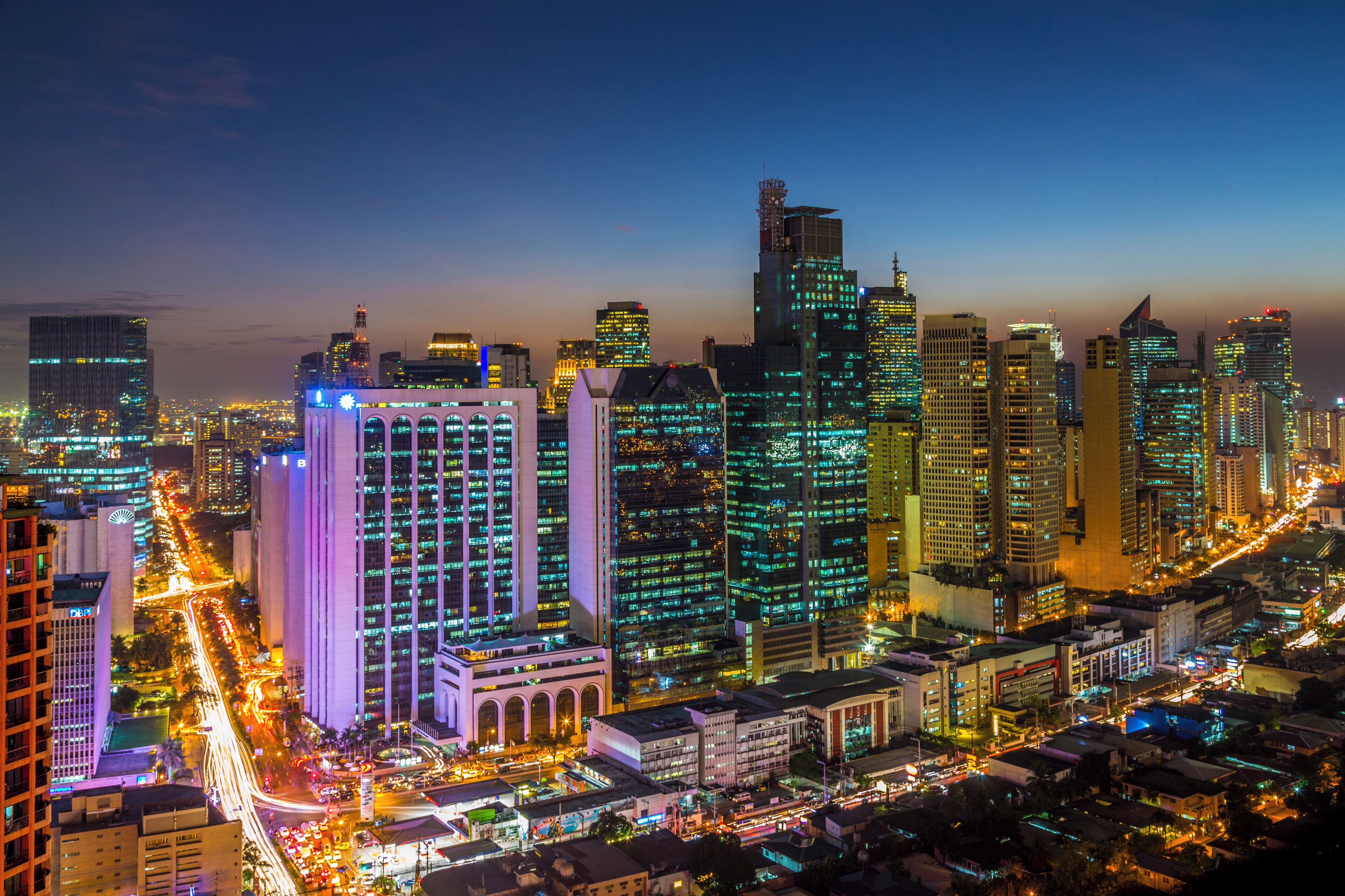 Makati (Central Business District) skyline, at twilight/night, Metro Manila, Philippines