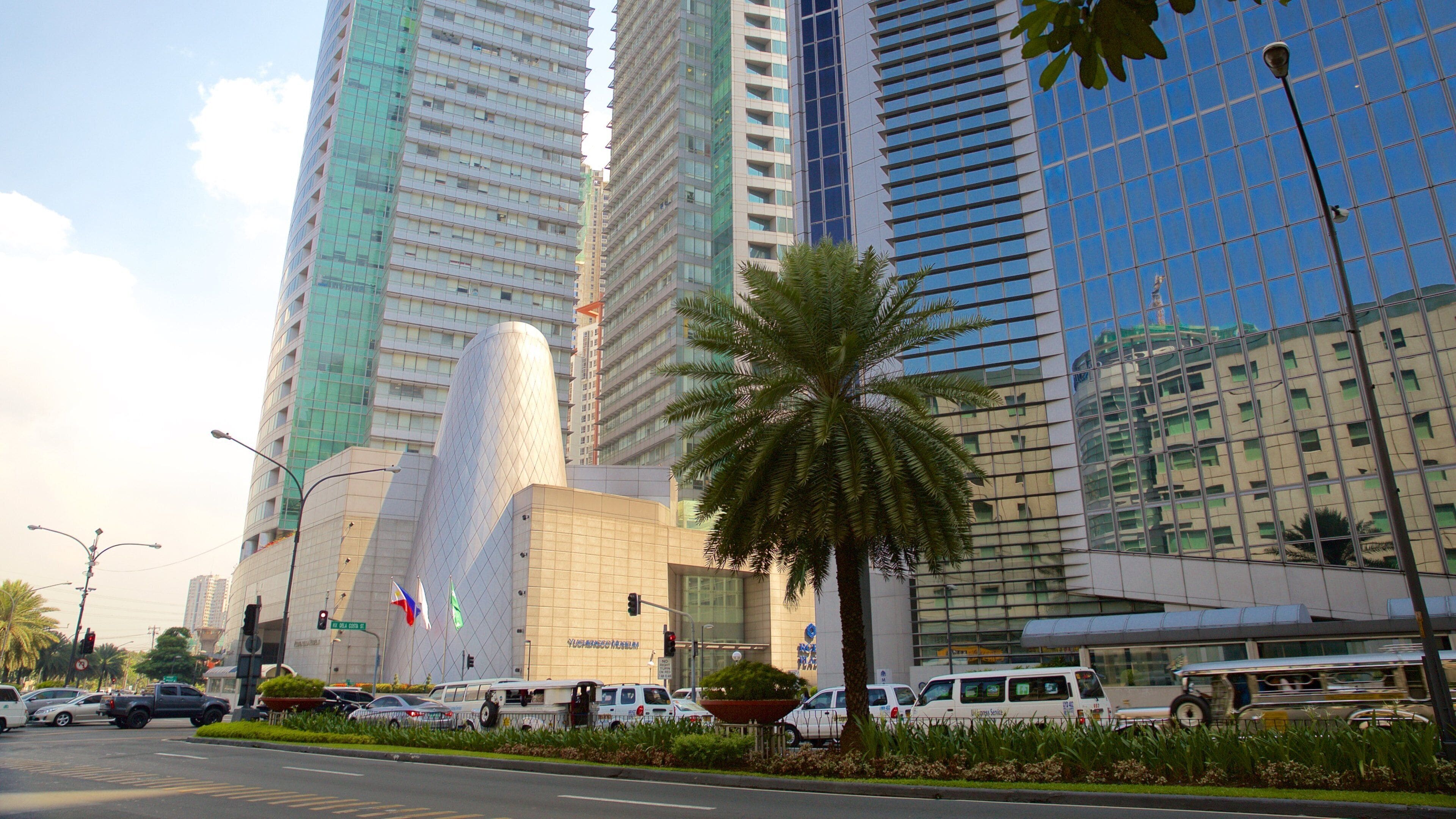 Makati which includes modern architecture, street scenes and a city
