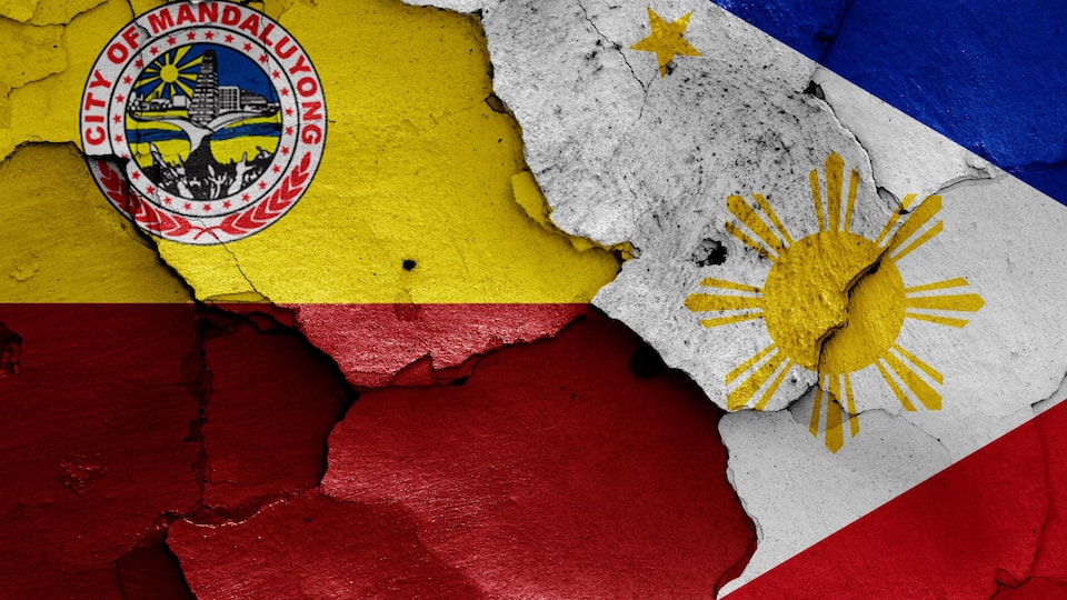 A cracked surface with the Philippine flag and the emblem of the City of Mandaluyong.