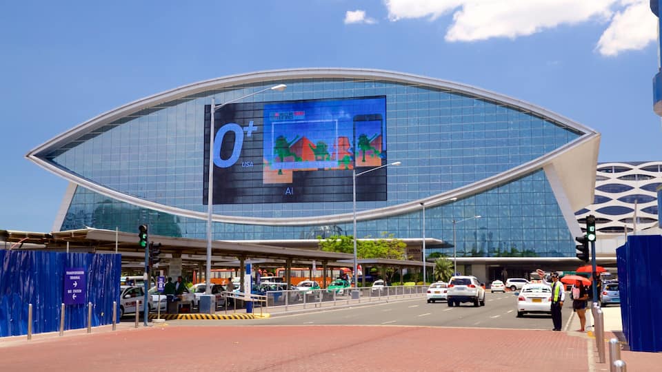 A modern building with a large digital display on its facade.
