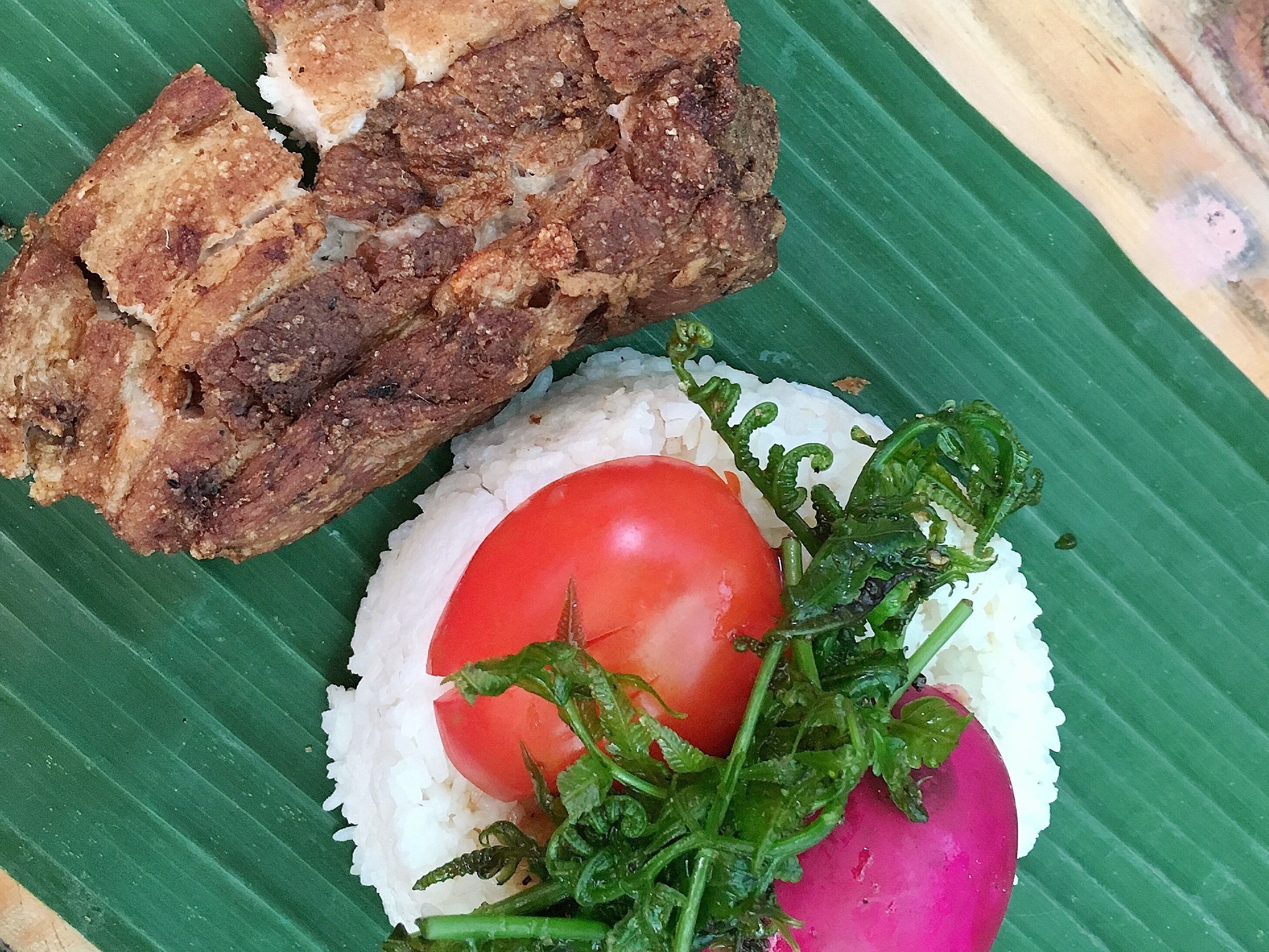 Filipino food served on banana leaf with rice, pako (fern) and salted egg. The picture shows the Lechon Kawali (deep fried pork) at a very affordable price of 4USD. The open air restaurant promotes zero waste management and encourage visitors to eat the dishes using their hands.
#Trovember