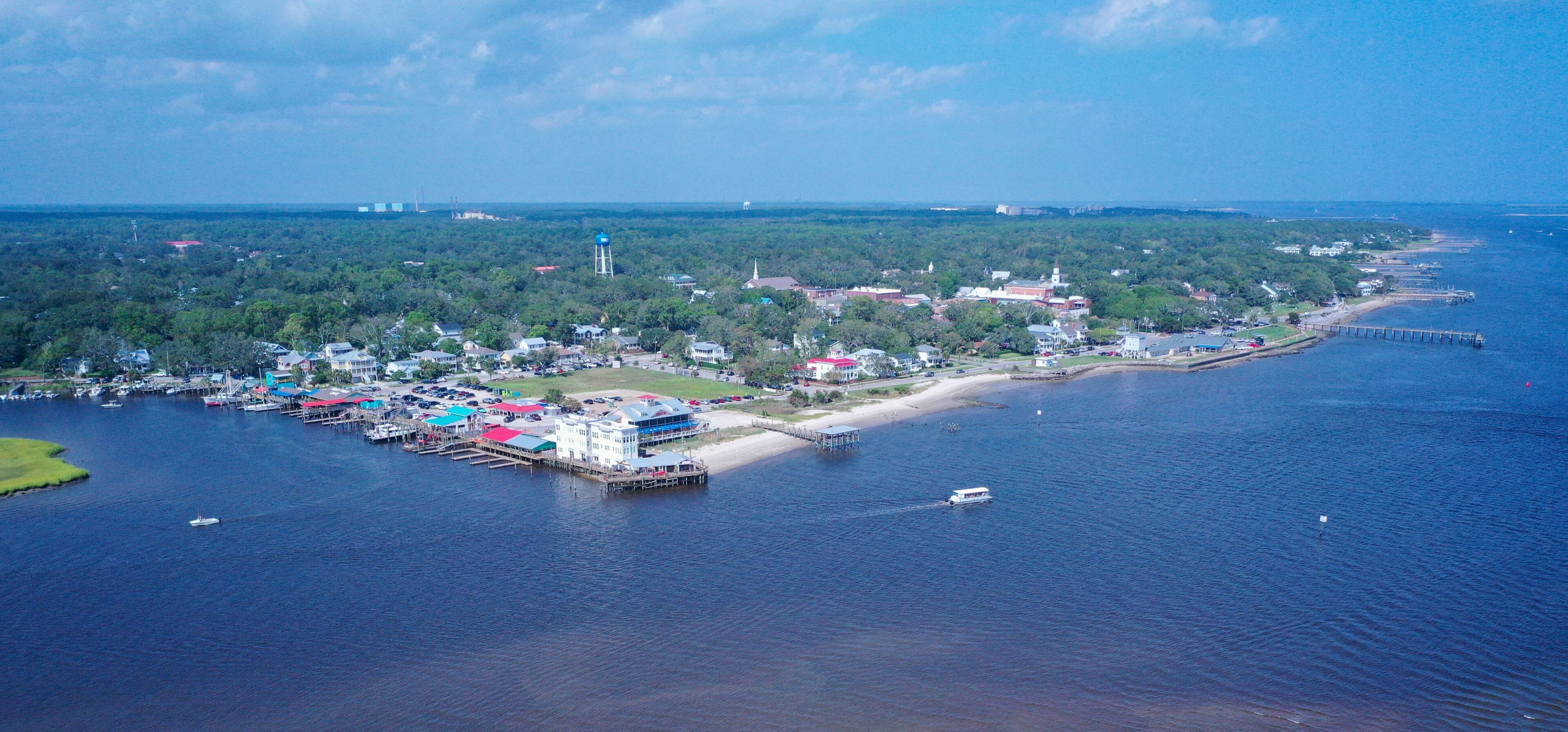 Looking at the restaurants along Southports NC shore line. Lots of boats on the water.