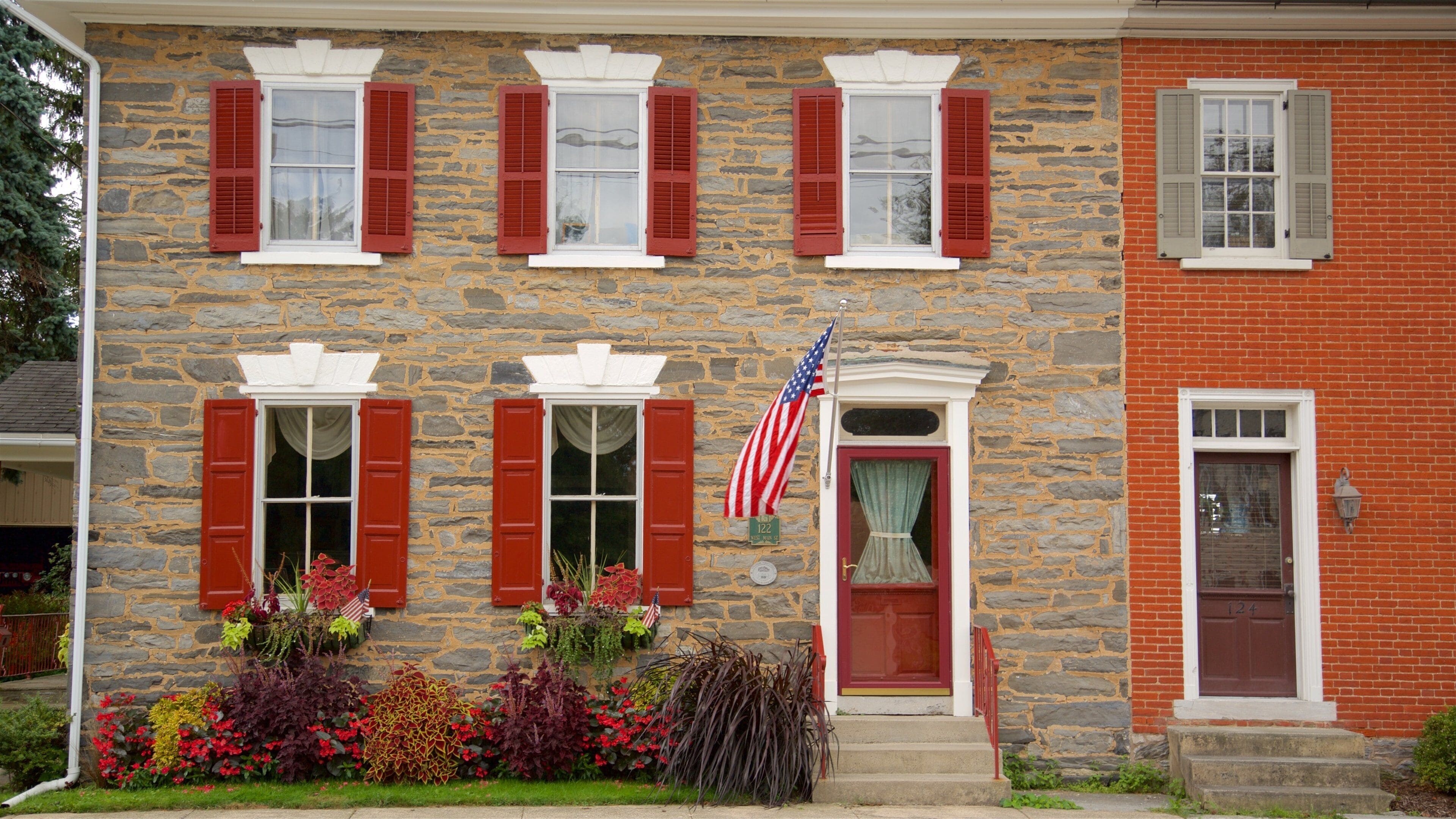 Strasburg featuring flowers and a house