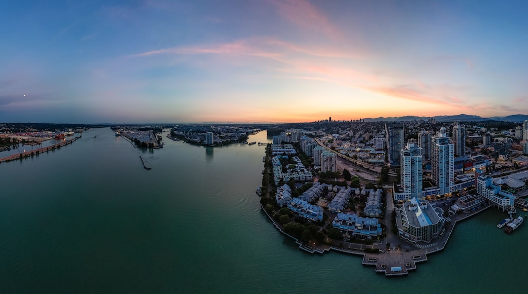 Panoramic View of City Buildings by river at twilight. New Westmister, Vancouver, BC, Canada. Aerial