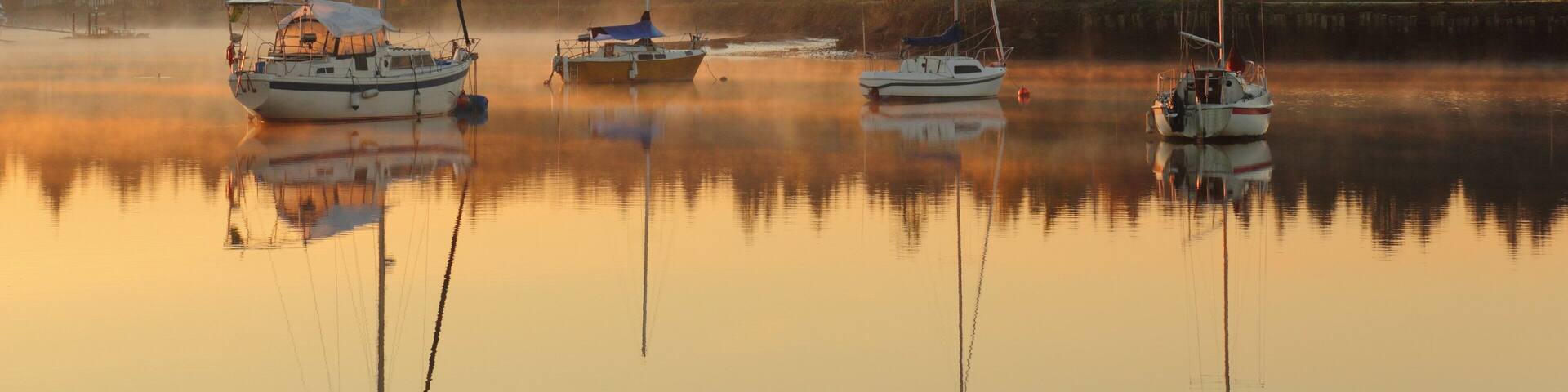 Nicomekl Anchorage, British Columbia. Mist rising in calm anchorage near the mouth of the Nicomekl River in Surrey, British Columbia, Canada.