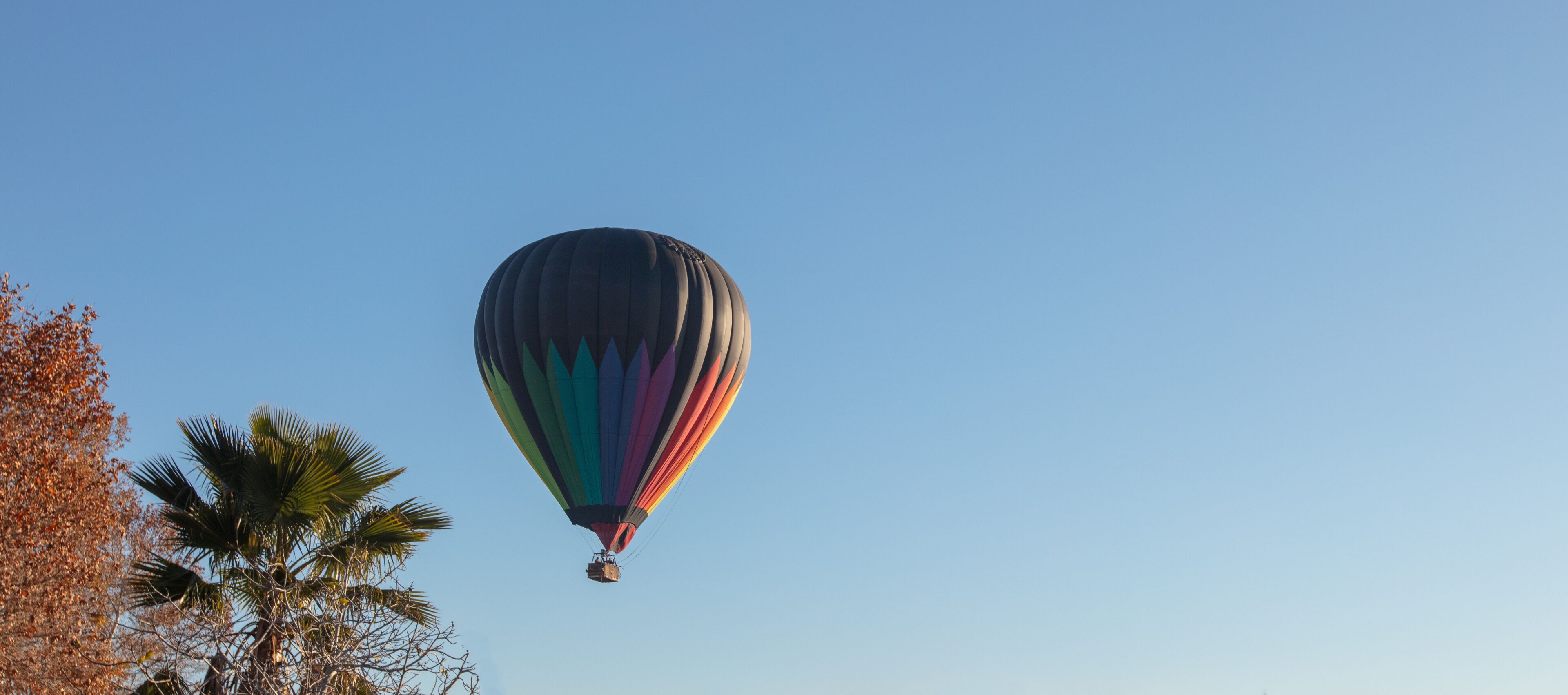Hot air balloon in the early morning golden hour over the Temecula Valley in southern California United States