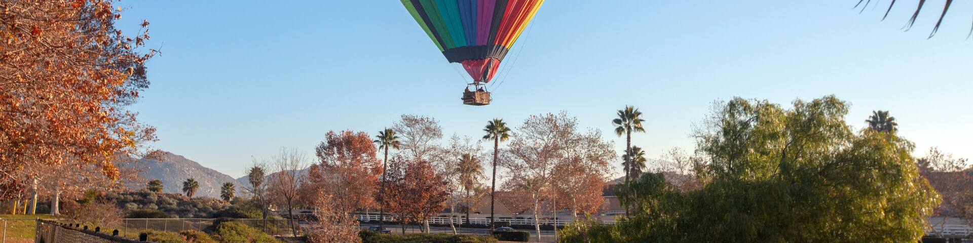 Hot air balloon in the early morning golden hour over the Temecula Valley in southern California United States
