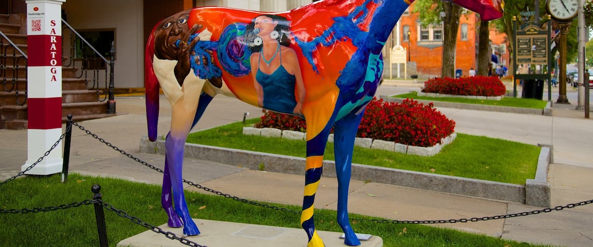 Saratoga Springs featuring outdoor art, a statue or sculpture and a city