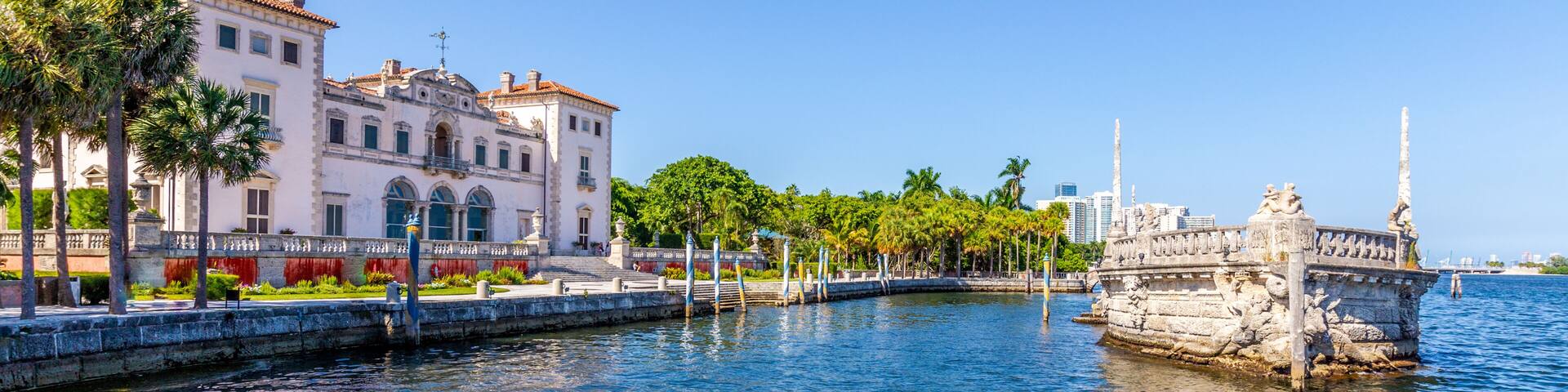 Stone breakwater barge and Magnificent Mansion,Vizcaya on Biscayne bay