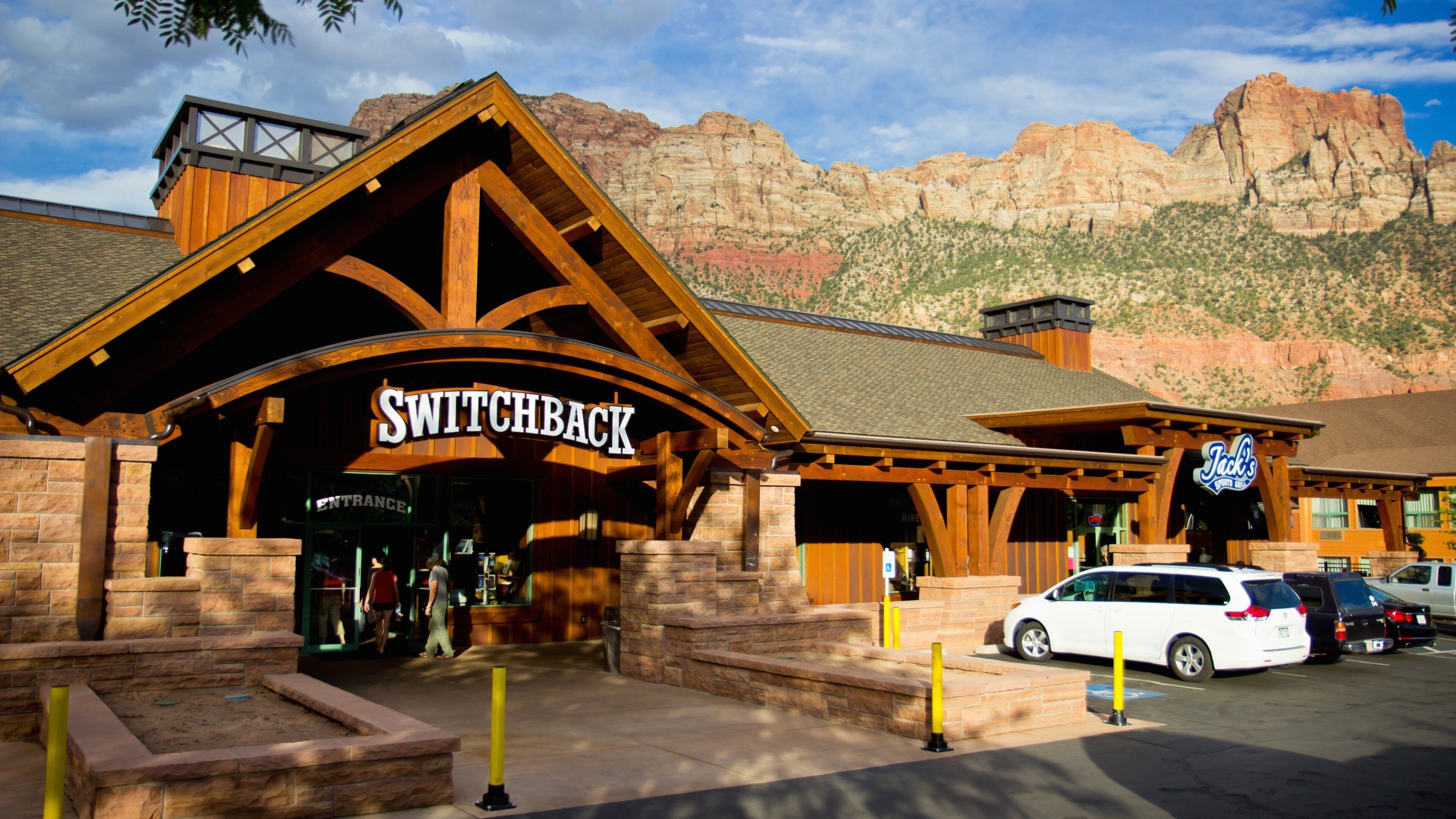 Springdale which includes a gorge or canyon and signage