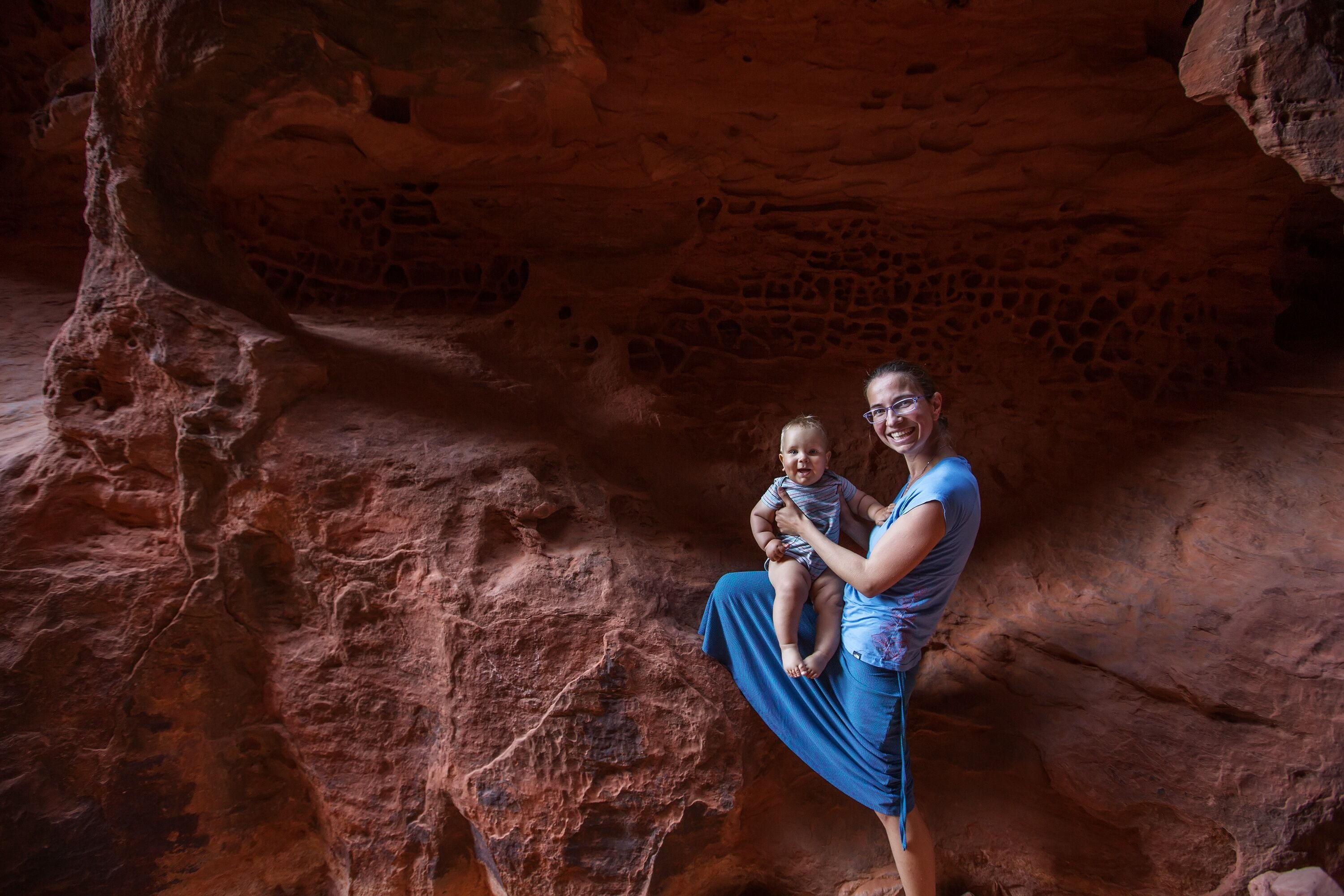Mother and son on a trail in volcanic Snow canyon State Park in Utah, USA