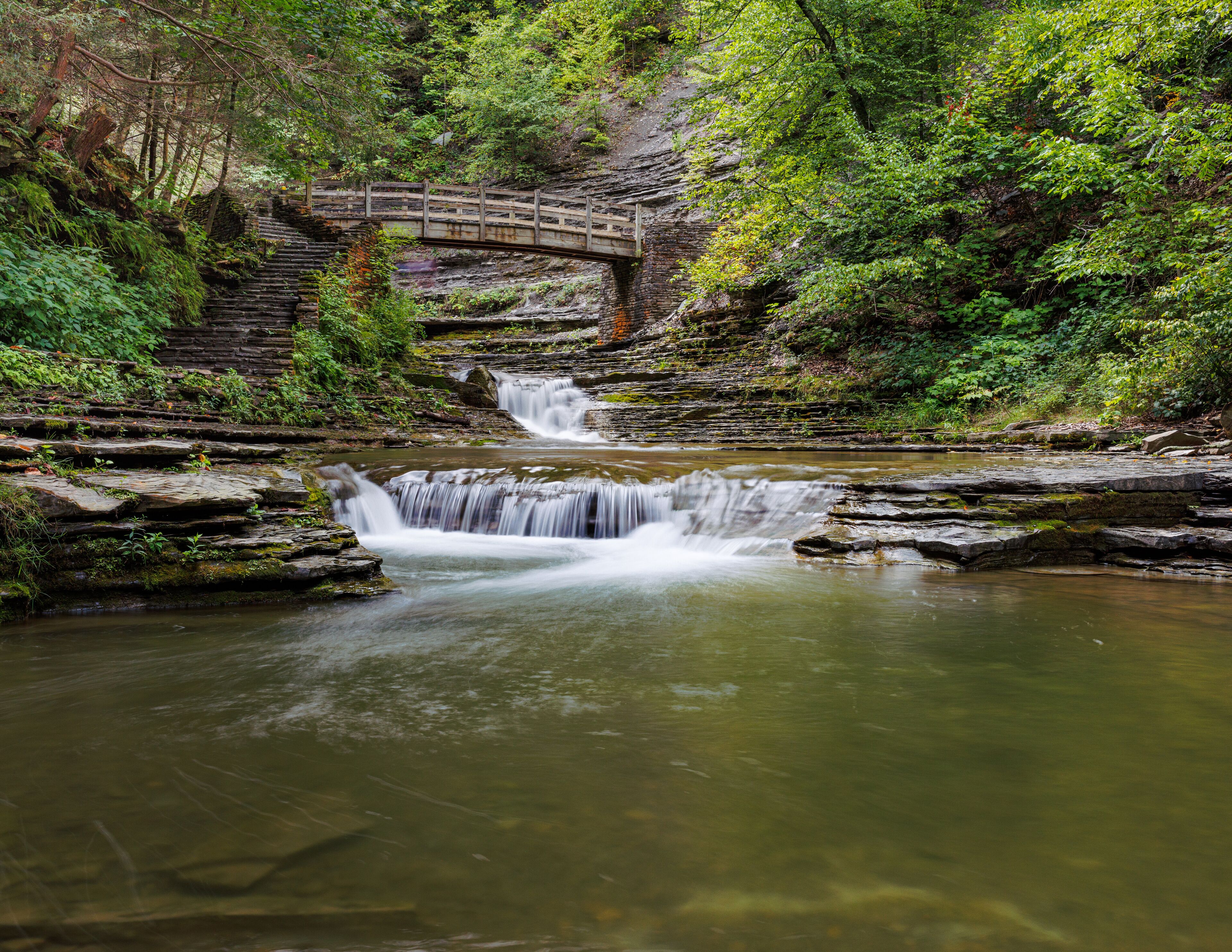 A bridge spans the river at Stony Brook State Park in upstate New York