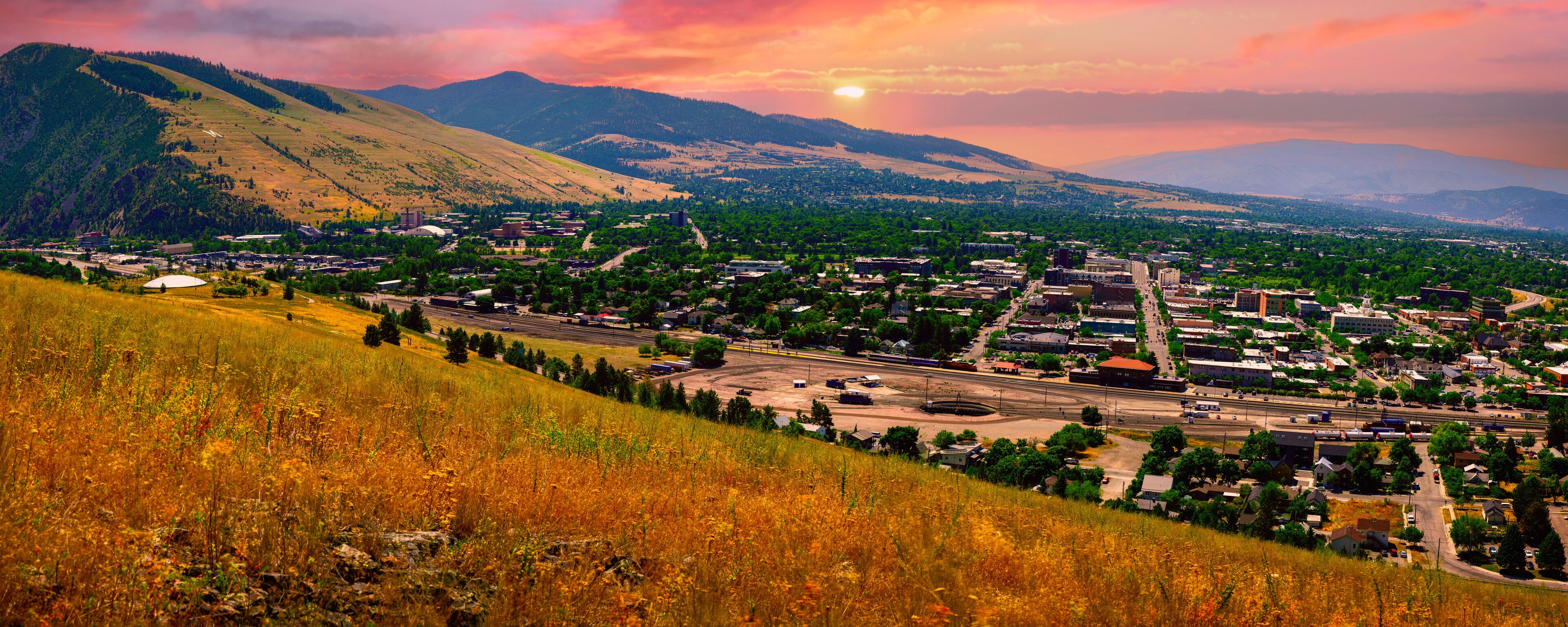 Missoula Montana Panoramic City Skyline: The beautiful cityscape surrounded by the Blue Mountain and Lolo National Forest in the Western USA
