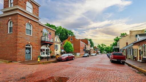The historic 18th century Main Street through the brick paved old town of St. Charles, Missouri, along the Missouri River.