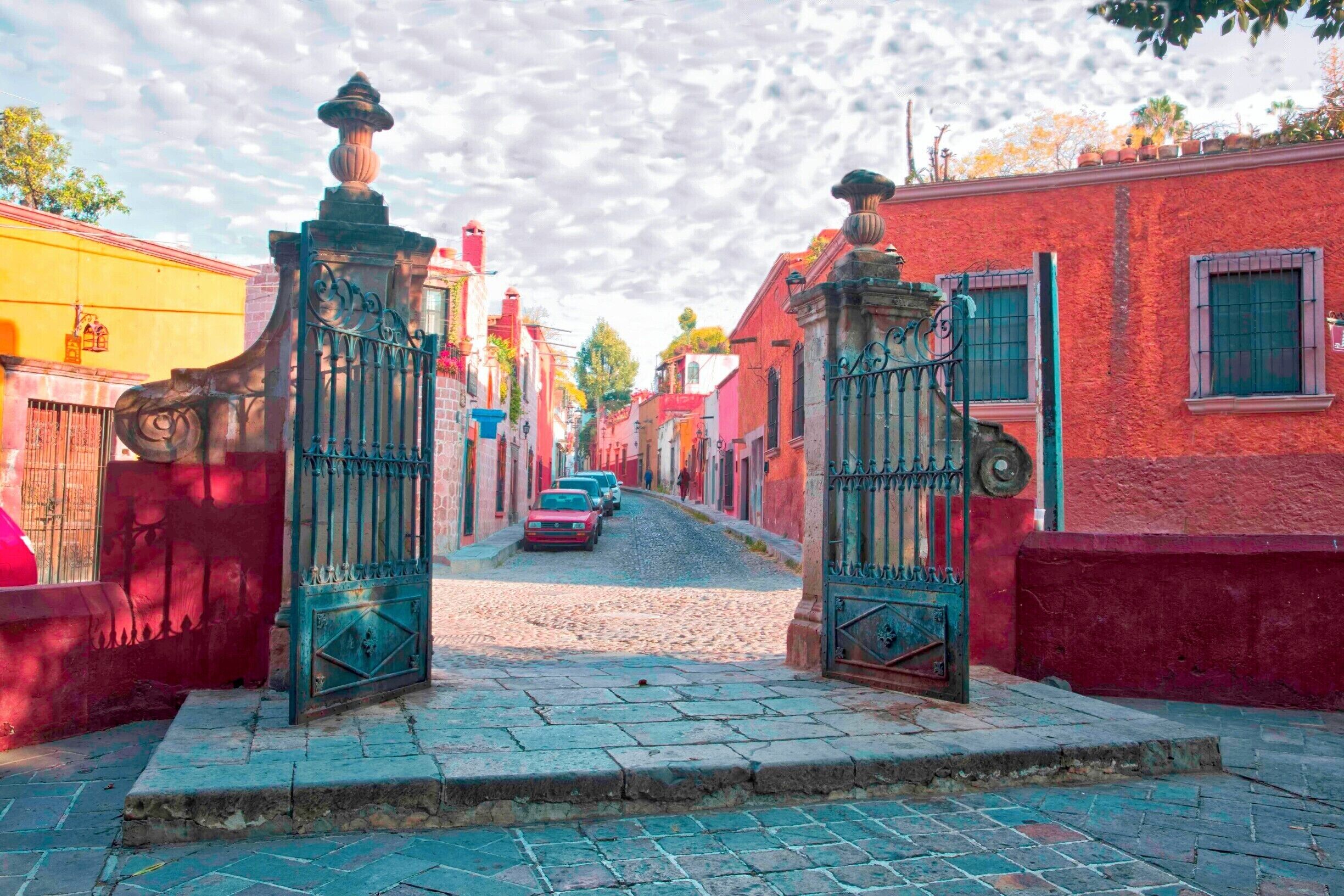 San Miquel de Allende is gorgeous in the early morning light. This exit from the City's central park shows the character of San Miquel's well-preserved architecture and cobblestone streets.