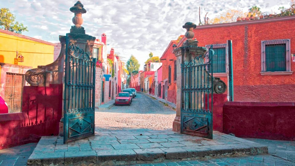 San Miquel de Allende is gorgeous in the early morning light. This exit from the City's central park shows the character of San Miquel's well-preserved architecture and cobblestone streets.