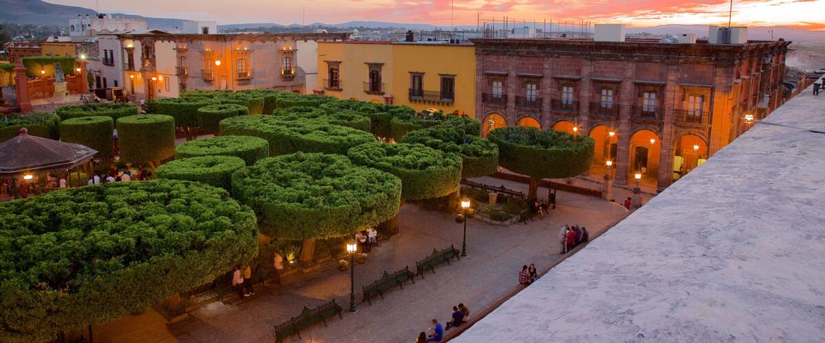 San Miguel de Allende showing a square or plaza, a park and a sunset