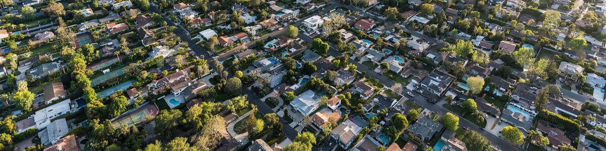 Late afternoon aerial view of Sherman Oaks and Encino in the San Fernando Valley area of Los Angeles, California.
