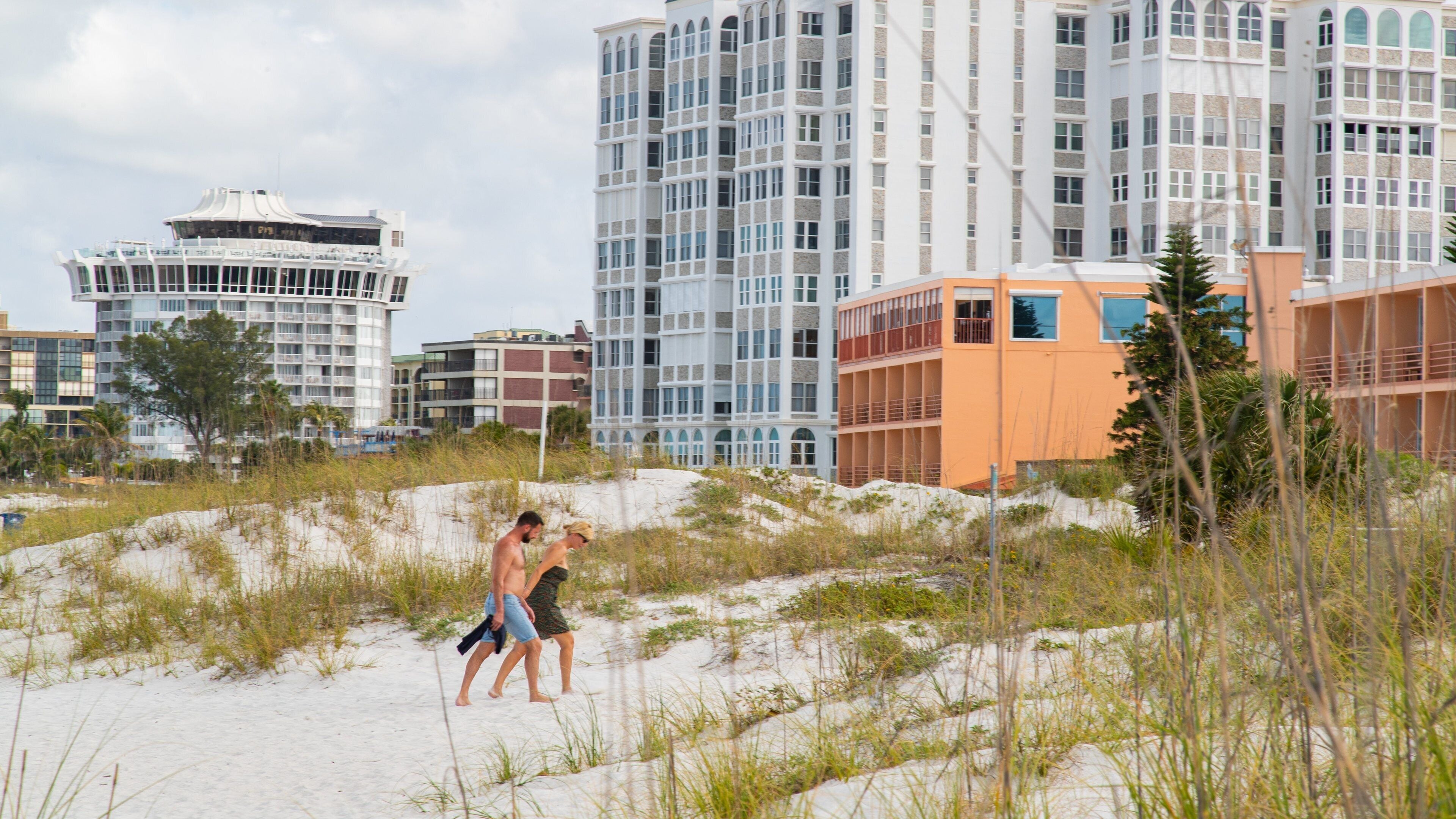 St. Pete Beach showing a sandy beach, a coastal town and general coastal views